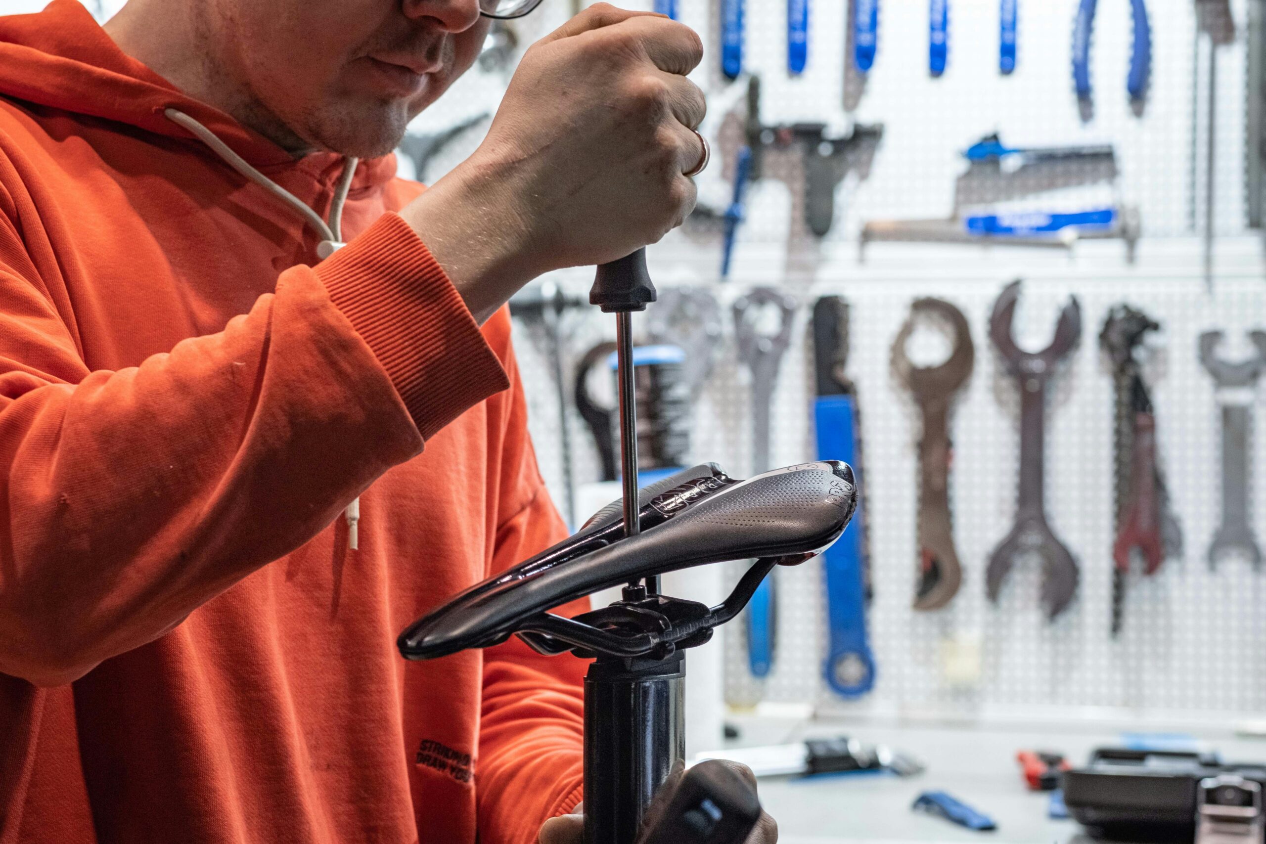 adjusting a bicycle saddle